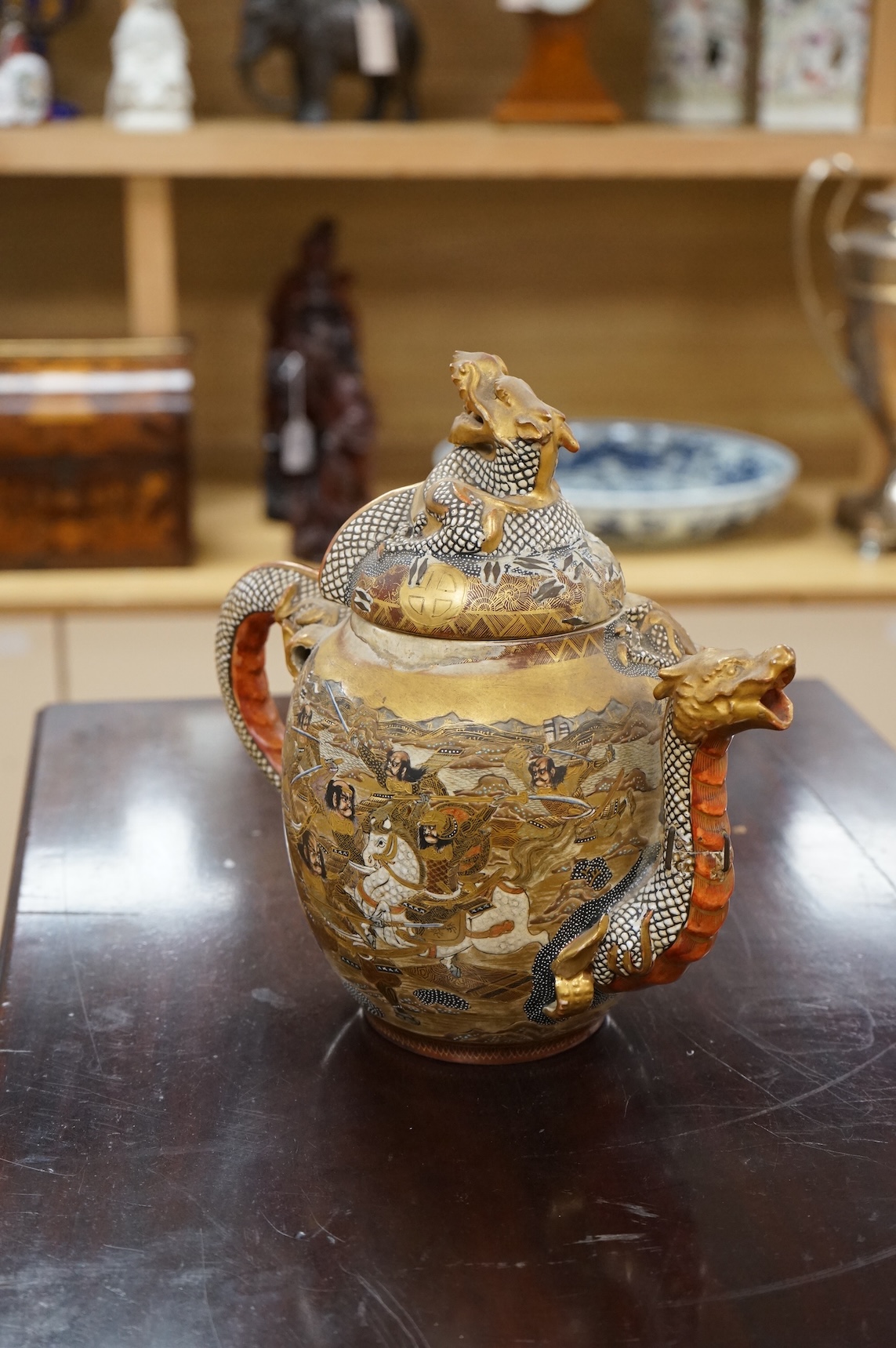 A Japanese Satsuma teapot dragon, Meiji period, 23cm high